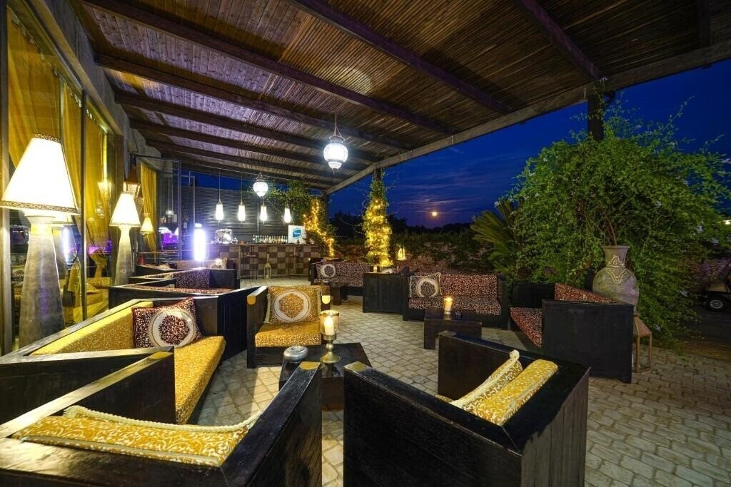 Фото Baia Dei Turchi Hotel 4*