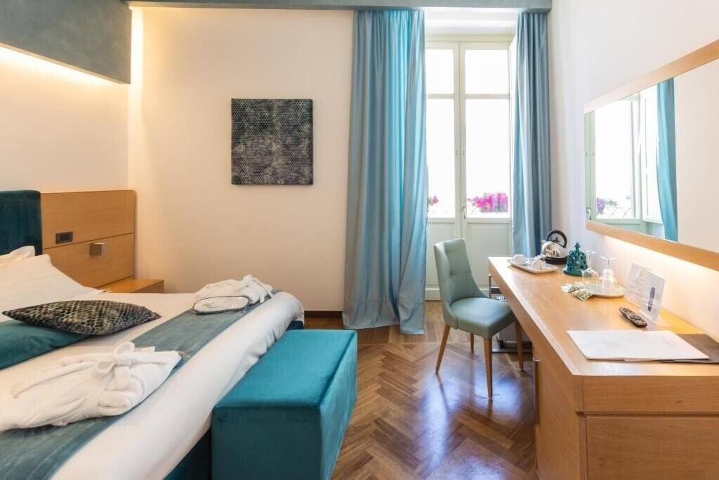 Фото Palazzo Filisio Hotel (Trani) 4*