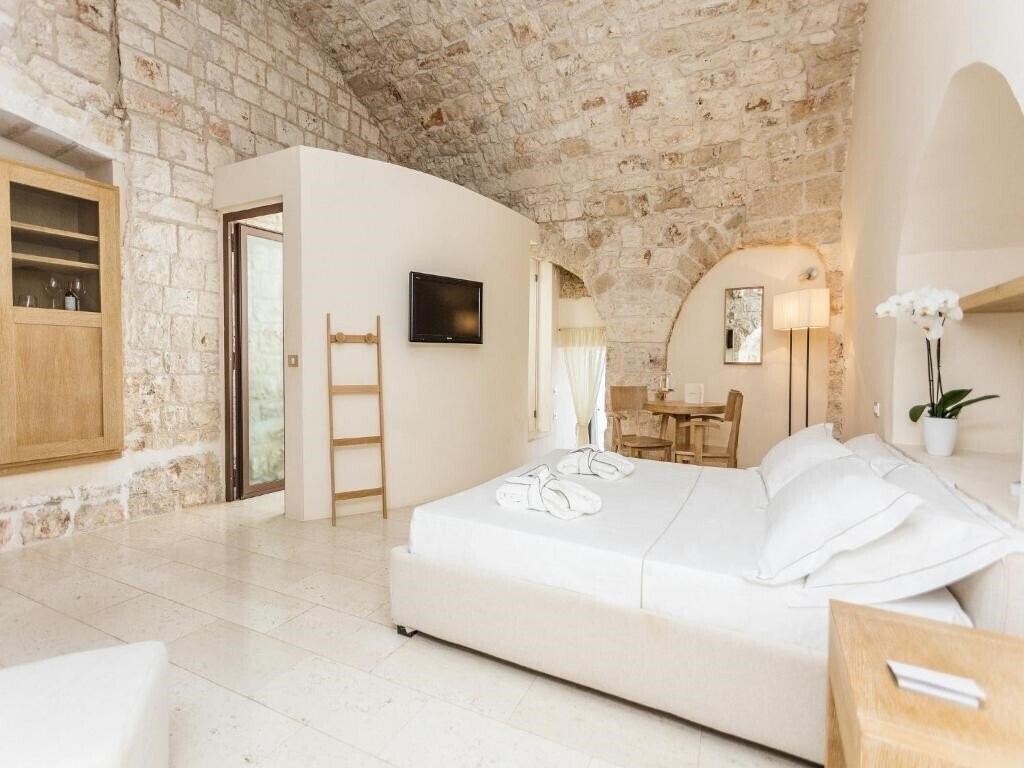 Фото La Sommita Relais (Ostuni) 5*