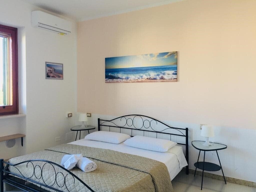Фото B&B Pizzomunno e Cristalda Rooms (Vieste) 3*