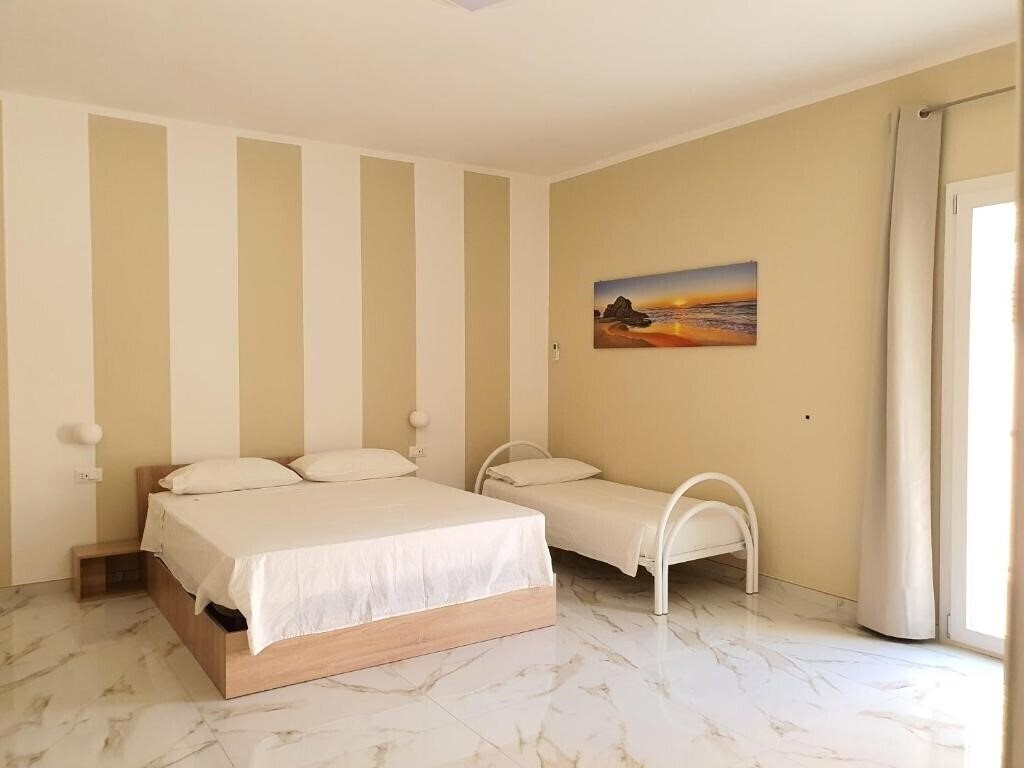 Картинка B&B Pizzomunno e Cristalda Rooms (Vieste) 3*