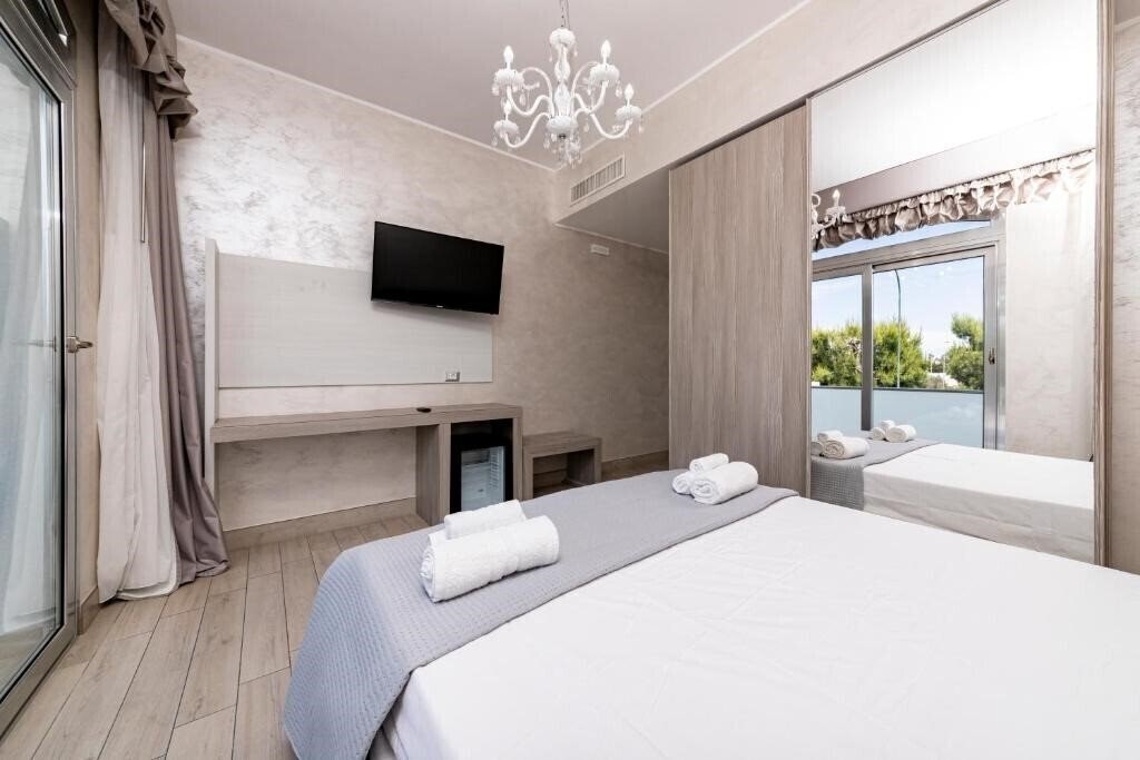 Фото Hotel Aurora (Porto Cesareo) 4*