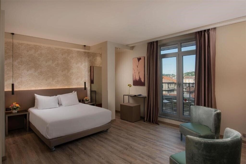 Фото NH Bergamo 4*