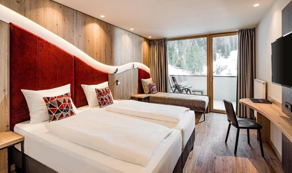 Фото Sporthotel Obereggen 4*