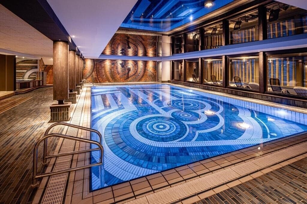 Фотографія Sporthotel Obereggen 4*