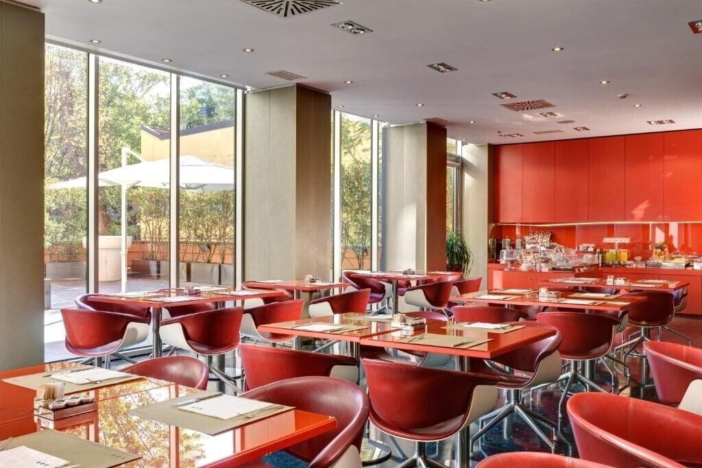 Фотографія Una Hotels Bologna Centro 4*