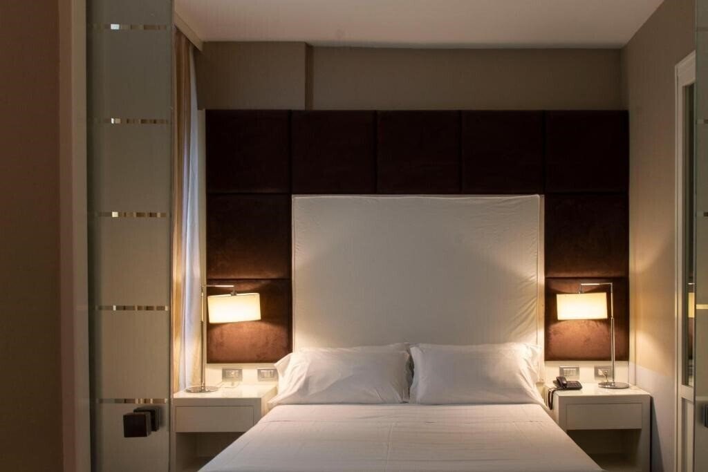 Отель 4 Viale Masini Design Hotel 4*