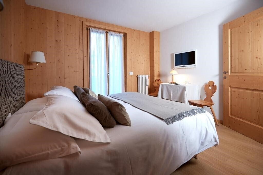Фотографія Meuble Cima Bianca Garni 3*