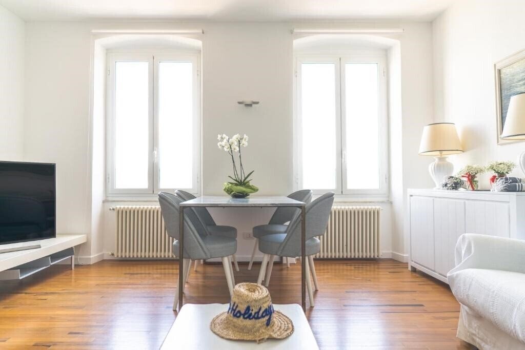 Фото About Italy Holiday Rooms & Apartments 4*