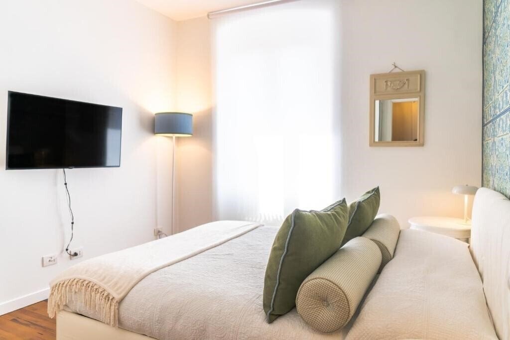Фотографія About Italy Holiday Rooms & Apartments 4*