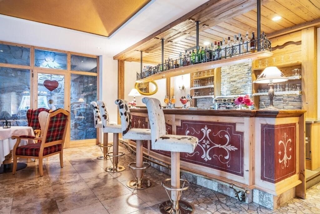 Фотографія Residence Anda Pozza di Fassa 4*