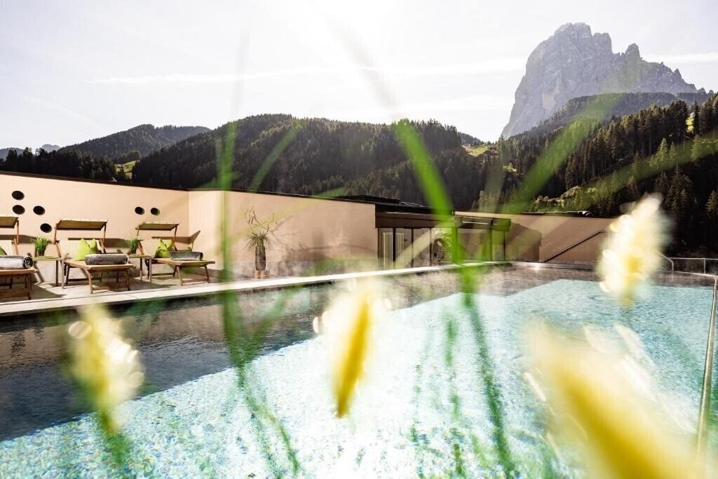 Отель Touring Val Gardena 4*