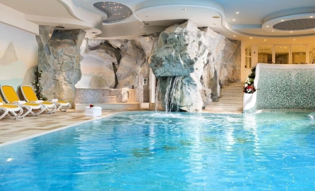 Фотографія Alpen Hotel Corona Vigo di Fassa 4*