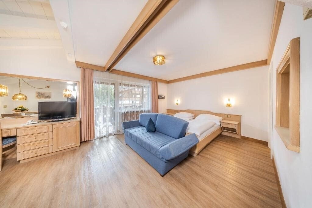 Фото Residence Villa Gran Baita Selva di Val Gardena 4*
