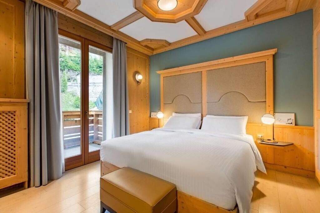 Фото Radisson Residences Savoia Palace Cortina d’Ampezzo 4*