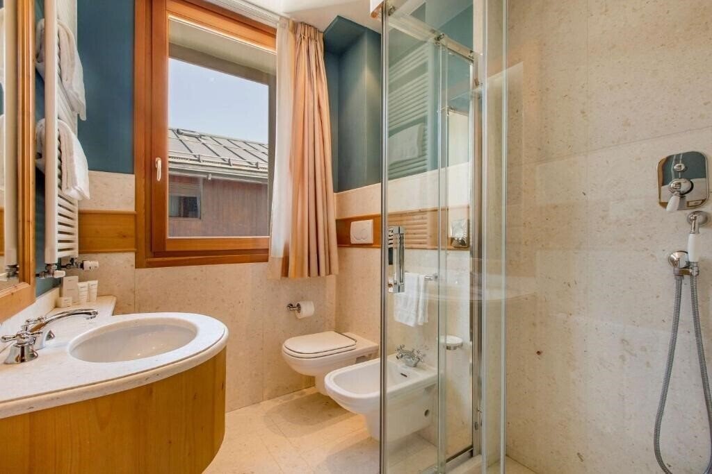 Фотографія Radisson Residences Savoia Palace Cortina d’Ampezzo 4*