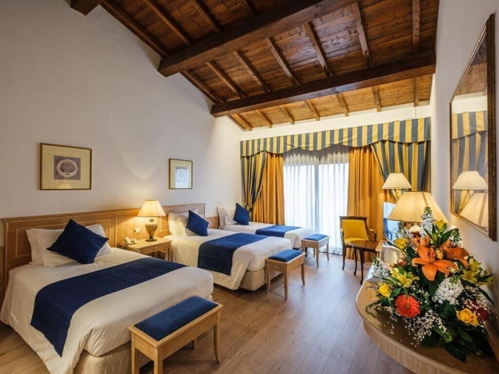Фото Orologio Hotel Ferrara 4*