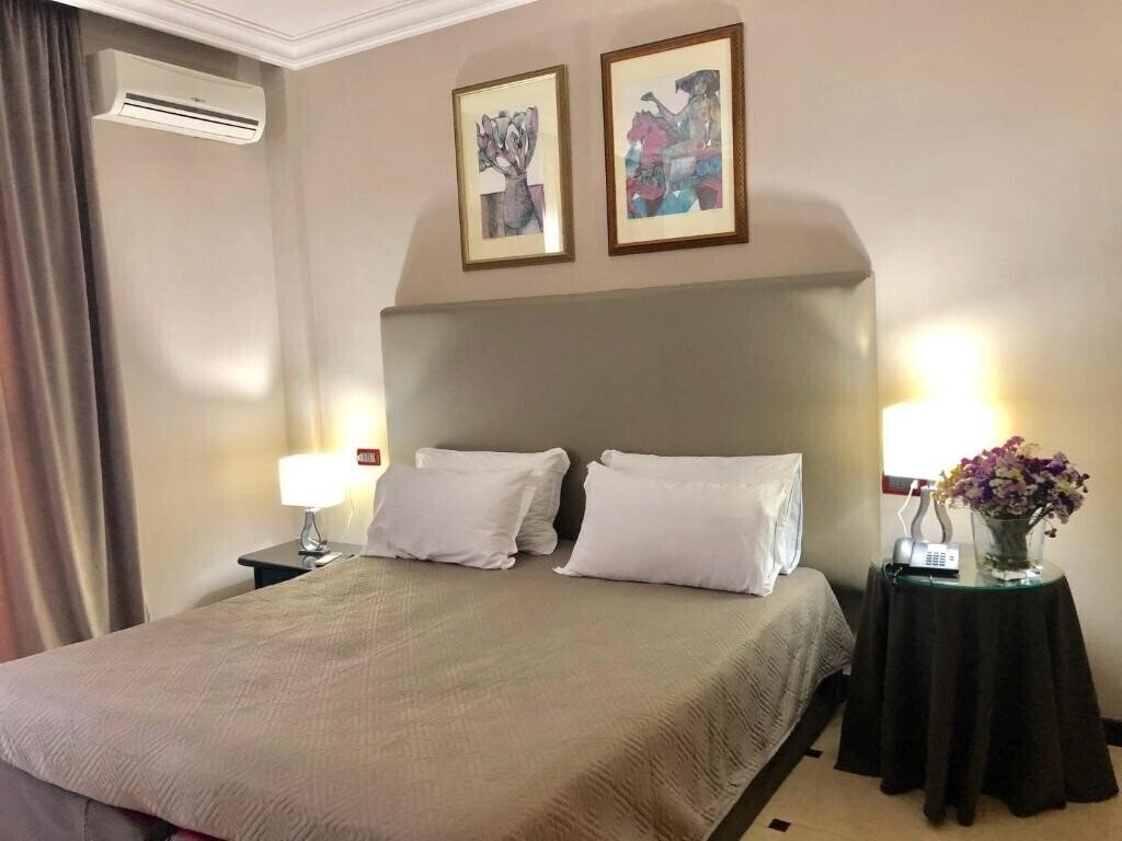 Фото Domizia Palace (Baia Domizia) 4*