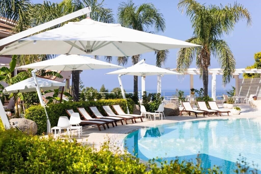 Фотографія L'Arcobaleno Resort 3*