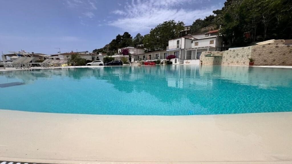 Фотография Villaggio Quattro Scogli 3*