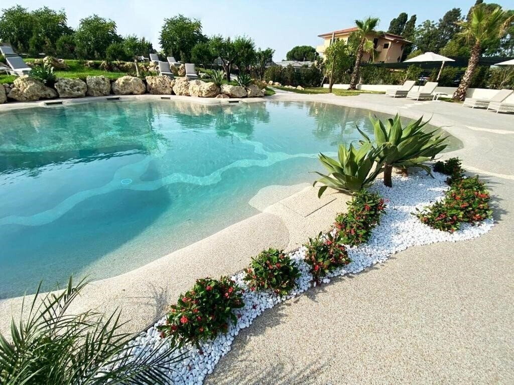 Фотографія Suite Hotel L’Oasi di Riaci (Santa Domenica) 4*