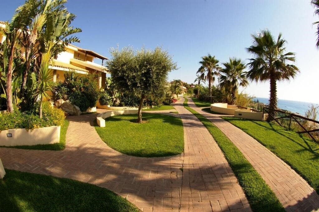 Фотографія Villaggio Cala Di Volpe 4*