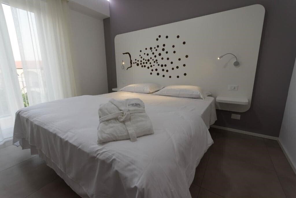 Отель Aether Suites Tropea 4*
