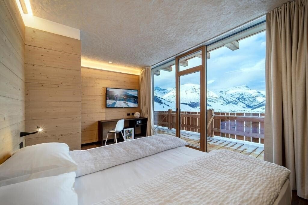 Фото Alpen Resort Bivio 4*