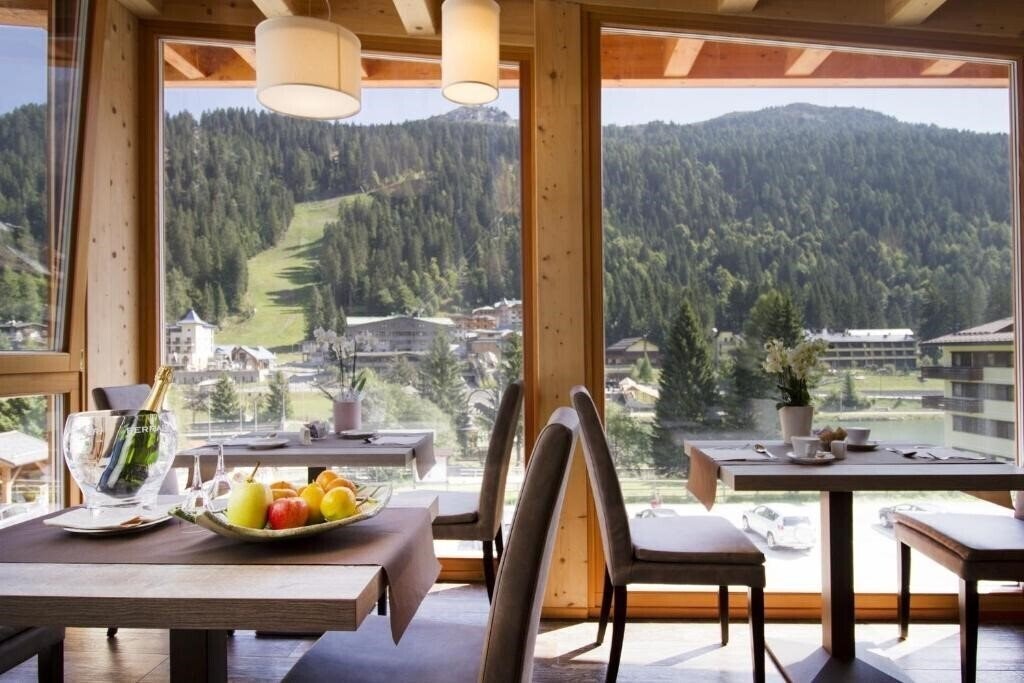 Отель Hotel Garni Caminetto 4*