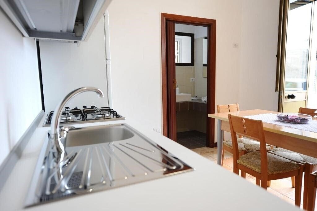 Фотографія Casa Vacanze Mamarose 3*