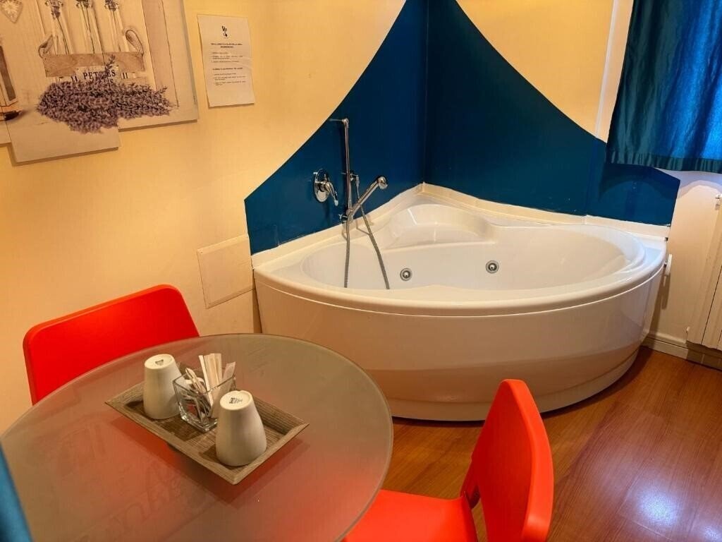 Фотографія Bracco Rooms & Suites 4*