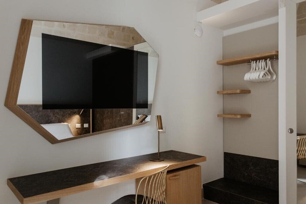 Фотографія Euvodia Luxury Rooms 4*