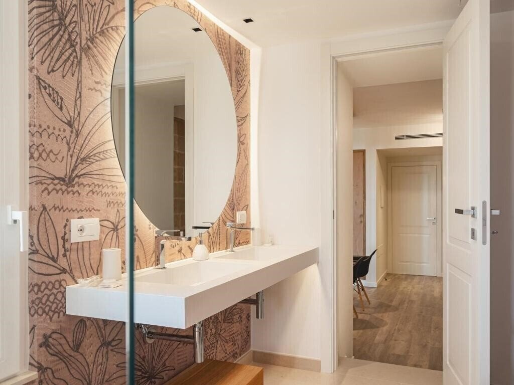 Фотографія Casenelcuore - Holiday Rooms 4*