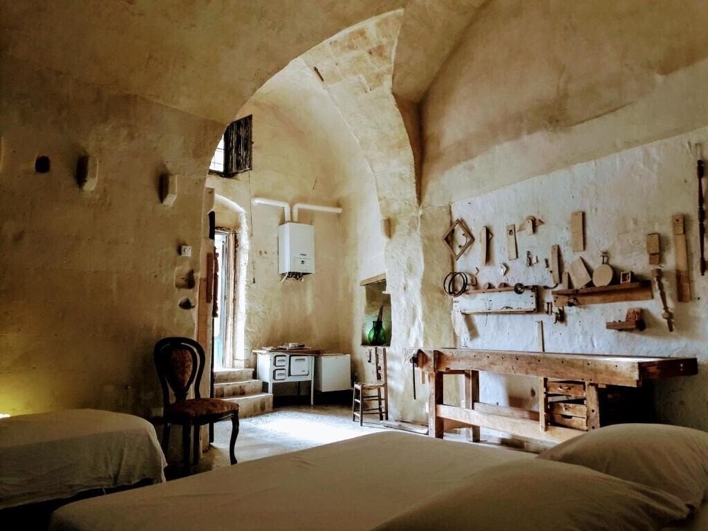 Отель Cave Rooms Sassi 3*