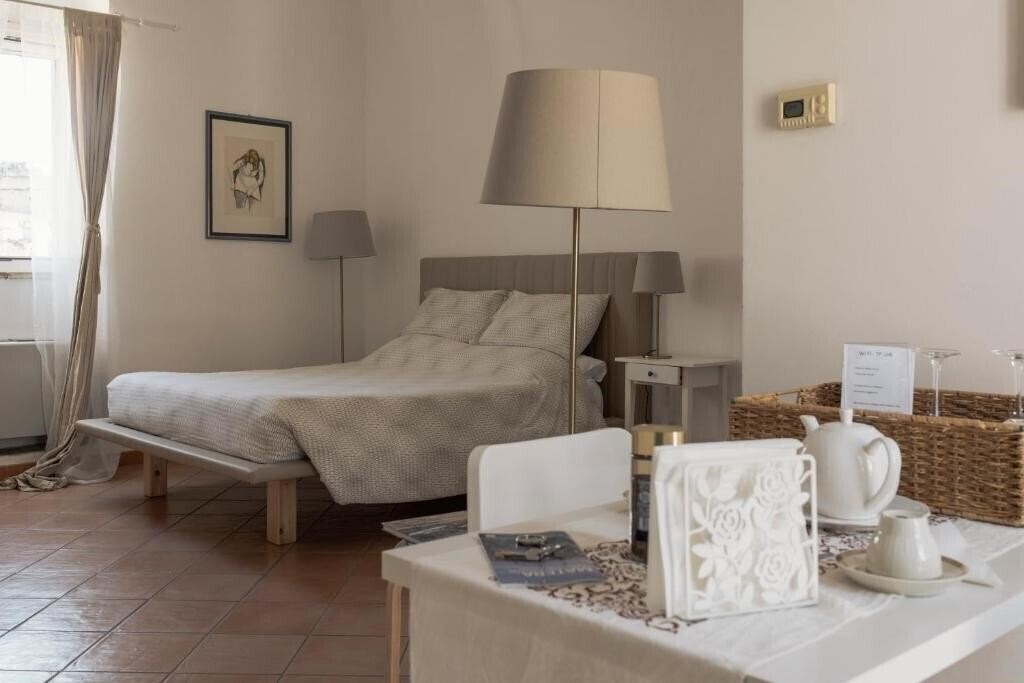 Фото Il Vicinato Casa Vacanza Immersa nel Cuore dei Sassi 3*