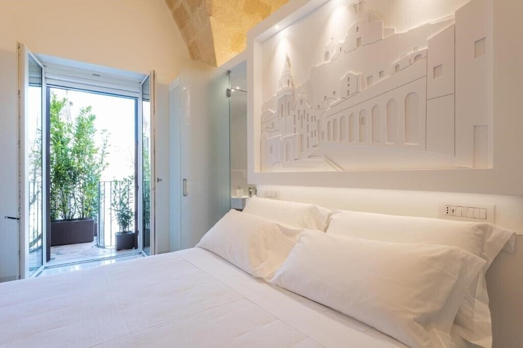 Фото Vittorio Veneto Matera Luxury Rooms 4*