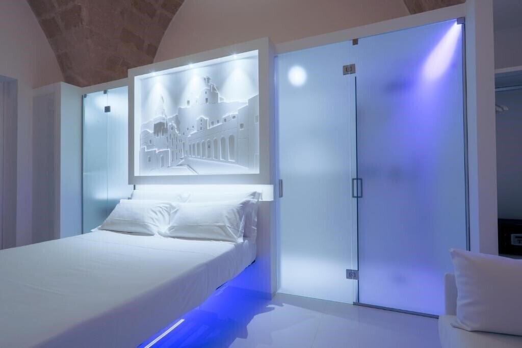 Фотографія Vittorio Veneto Matera Luxury Rooms 4*