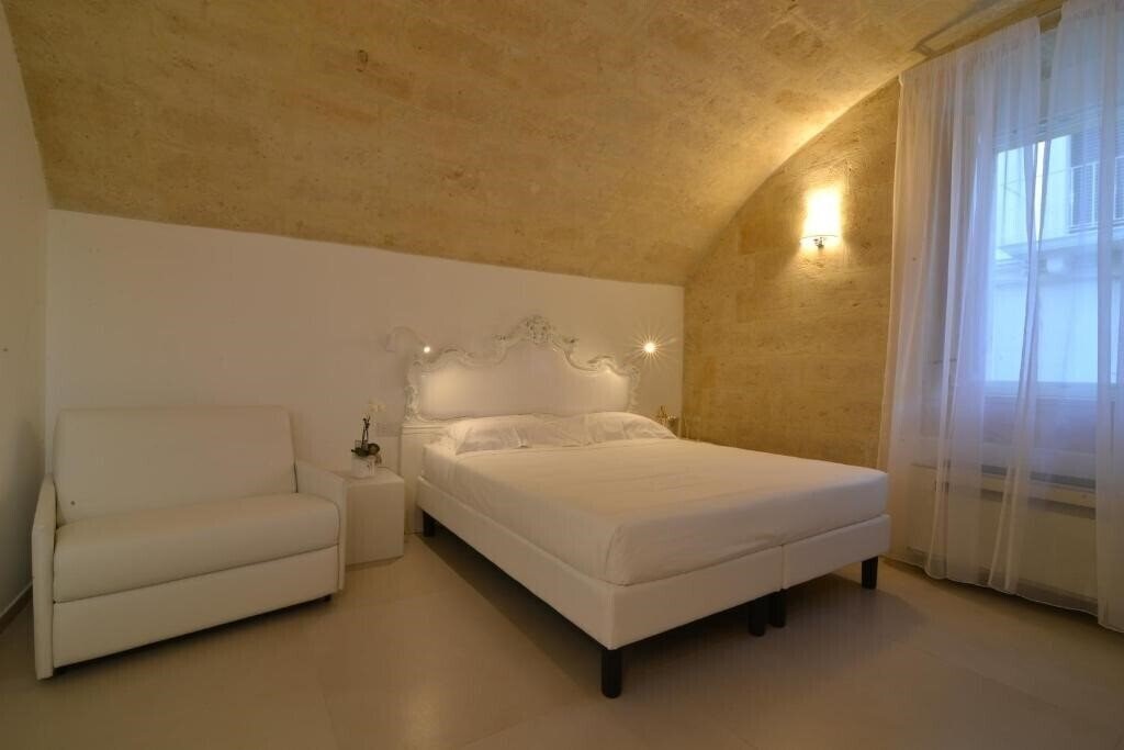 Фото Casa Blanca Matera 4*