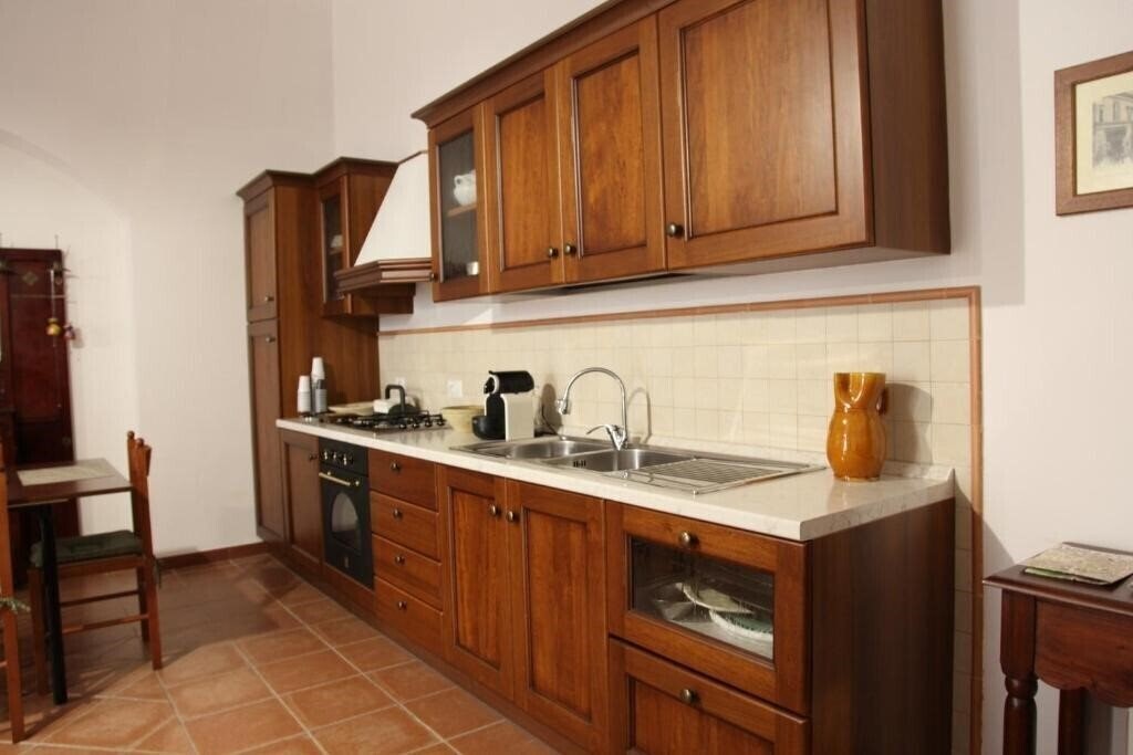 Фотографія In Centro Holiday Home 3*