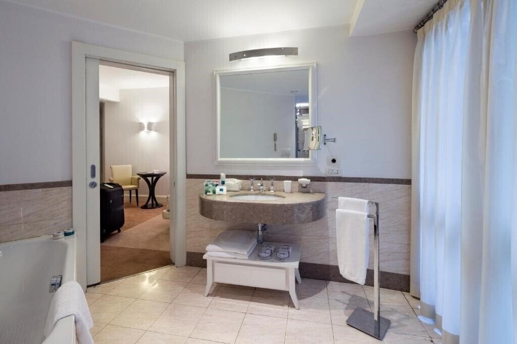 Фотографія Una Maison Milano 4*