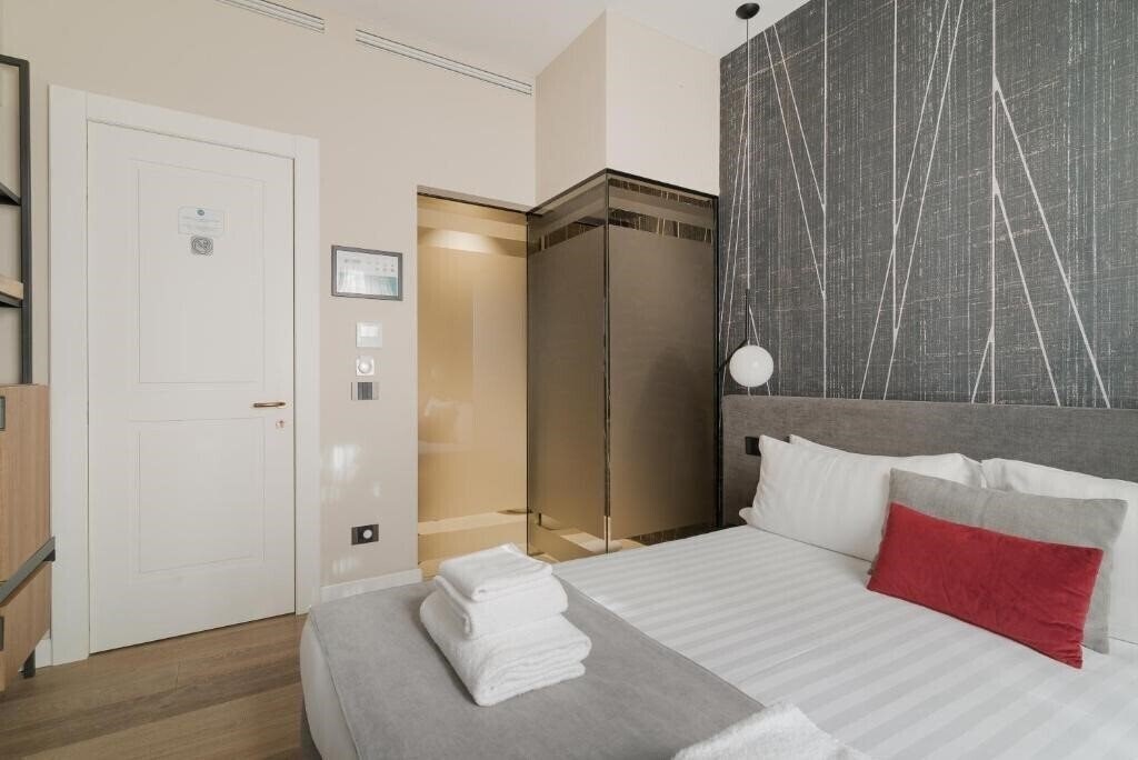 Фото Della Spiga Suites By Brera Apartments 3*