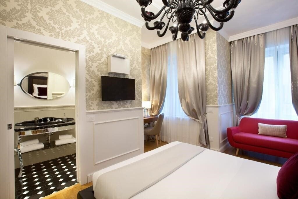 Фотографія Duomo Rooms Milano 3*