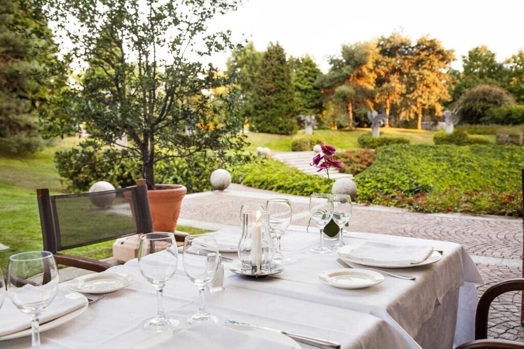 Фотографія Cosmo Hotel Torri Vimercate 4*