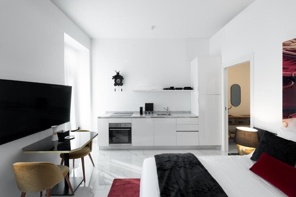 Фотографія Joivy Boutique Apartments Farneti 4*