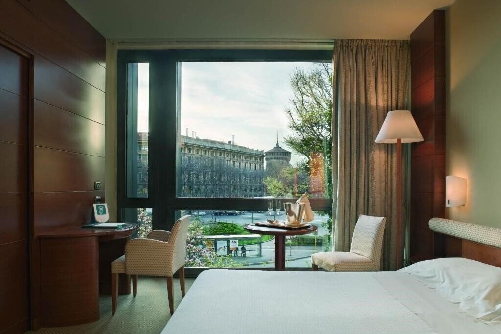 Фото Una Hotel Cusani 4*