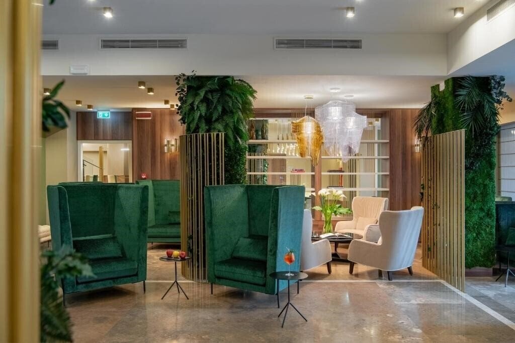 Отель Una Hotel Tocq 4*