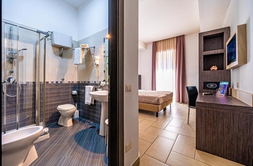 Фотографія Napoli Suite 3*