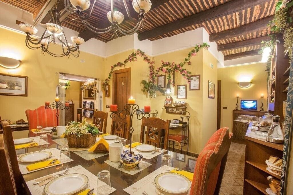 Фотография B&B Alloggio dei Vassalli 3*