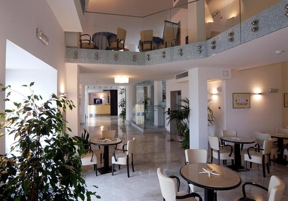 Фотографія Villa Carolina 4*