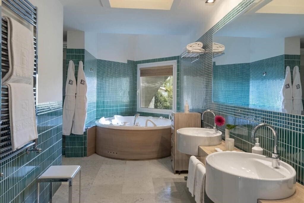 Фотографія L'Ea Bianca Luxury Resort 5*